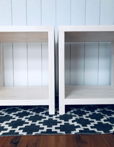 two white side tables